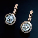Boucles d'oreilles vintage solitaire diamant en or rose