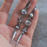 Boucles d'oreilles pendantes étoile en strass