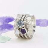 Bague vintage en argent et pierres précieuses