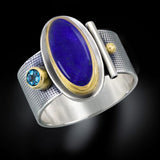 Bague vintage en argent avec pierre ovale bleue