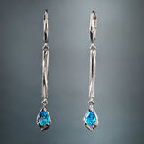 Boucles d'oreilles pendantes vintage en argent bleu