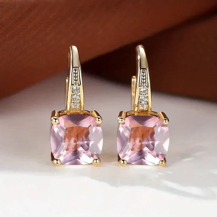 Boucles d'oreilles créoles en or avec pierres mystérieuses