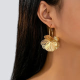 Boucles d'oreilles Exagérées™ | Or creux, élégance raffinée
