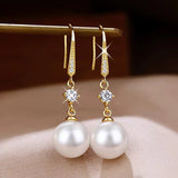 Éclat d'Or™ | Boucles d'oreilles dorées en matière raffinée