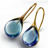 Boucles d'oreilles en cristal en forme de goutte d'eau dorées