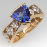 Bague vintage en or avec pierre bleue creuse et zircone