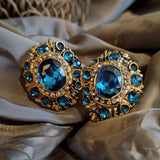 Boucles d'oreilles en cristal bleu et or