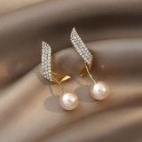 Boucles d'oreilles™ | Élégance en perles dorées