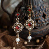Boucles d'oreilles en cristal rouge en forme de goutte