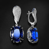 Boucles d'oreilles vintage bleues brillantes