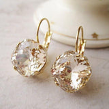 Boucles d'oreilles vintage en verre arrondi et or