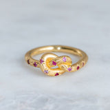 Bague vintage rose nouée en or céleste