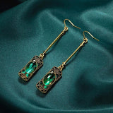 Boucles d'oreilles pendantes Green Lantern en or