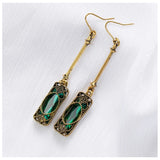 Boucles d'oreilles pendantes Green Lantern en or