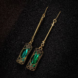 Boucles d'oreilles pendantes Green Lantern en or