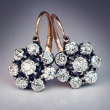 Boucles d'oreilles vintage rondes à fleurs brillantes