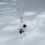Collier symbole infini cœurs empreinte de patte