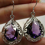 Boucles d'oreilles vintage en verre violet