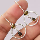 Boucles d'oreilles vintage en argent avec verre vert circulaire