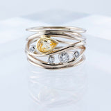 Bague vintage en or avec zircone jaune superposée