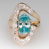 Bague vintage en or avec zircone bleue irrégulière