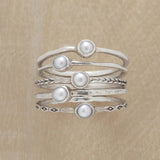 Bague vintage en argent avec fine couche de perles