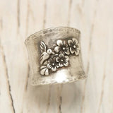Bague large bande oiseau fleur