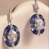 Boucles d'oreilles vintage blanches et bleues brillantes