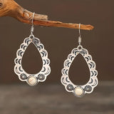 Boucles d'oreilles creuses vintage avec perles pendantes