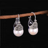 Boucles d'oreilles vintage en argent incrustées de perles