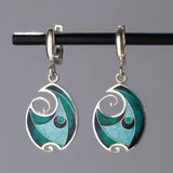 Boucles d'oreilles vintage en argent et émail bleu