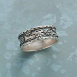 Bague vintage en argent avec marguerite