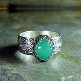 Bague émeraude fleur sculptée
