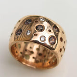 Bague vintage en or incrustée de grenat et de zircone blanche