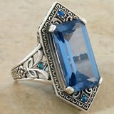 Bague creuse vintage en argent et verre bleu