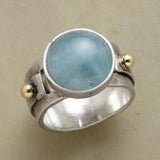 Bague ronde vintage avec pierre incrustée bleue