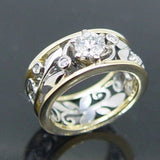 Bague vintage creuse en or et argent brillant