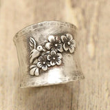 Bague large bande oiseau fleur