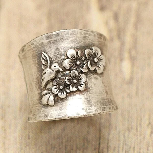 Bague large bande oiseau fleur