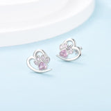 Boucles d'oreilles en forme de patte et de cœur avec zircone