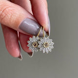 Boucles d'oreilles vintage en platine en forme de fleur
