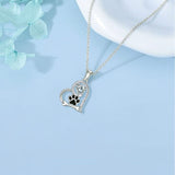 Collier artisanal avec empreinte de patte de chien et os en zircone