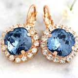 Boucles d'oreilles vintage en or avec zircone bleue arrondie