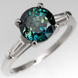 Bague vintage en argent avec zircone bleue verdâtre arrondie