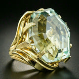 Bague vintage en verre jaune verdâtre et or