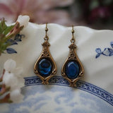 Boucles d'oreilles bohèmes en or incrustées de pierres
