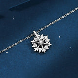 Collier rotatif avec flocon de neige en argent