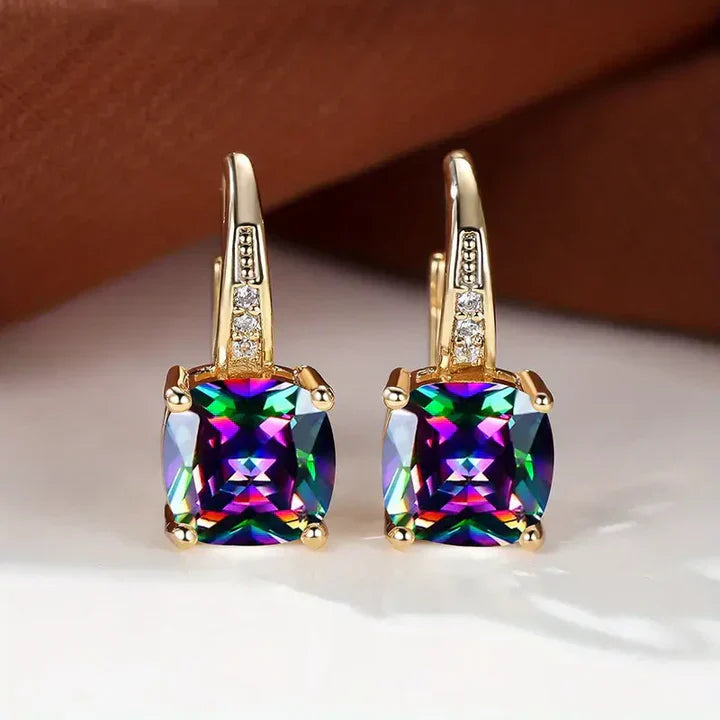 Boucles d'oreilles créoles en or avec pierres mystérieuses