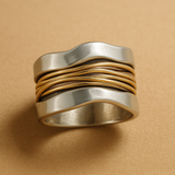 Bague en argent avec fils dorés