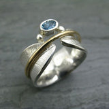 Bague vintage à feuille tournante avec aigue-marine